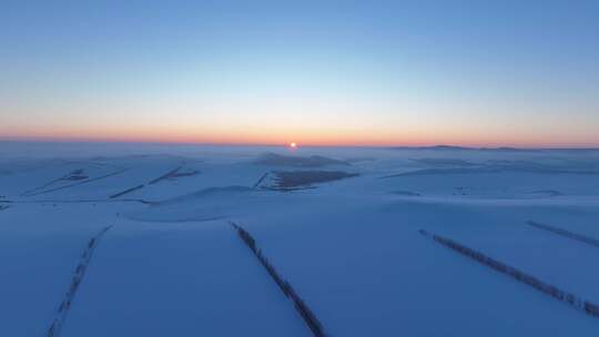 航拍大兴安岭垦区丘陵山地冬季雪景暮色