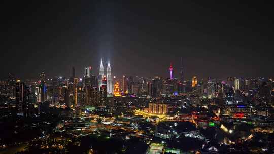 马来西亚吉隆坡莫迪卡石油双子塔夜景航拍