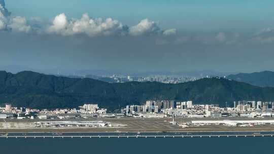 5k航拍深圳机场飞机起降落海上公路轮船出海