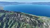 航拍中国新疆被群山环绕的赛里木湖晴天风光高清在线视频素材下载