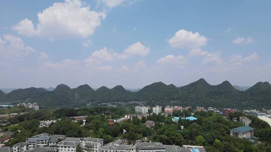 城市祖国山川蓝天白云山中城市贵阳花溪航拍