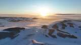 丘陵雪原灿烂夕阳壮丽景观高清在线视频素材下载