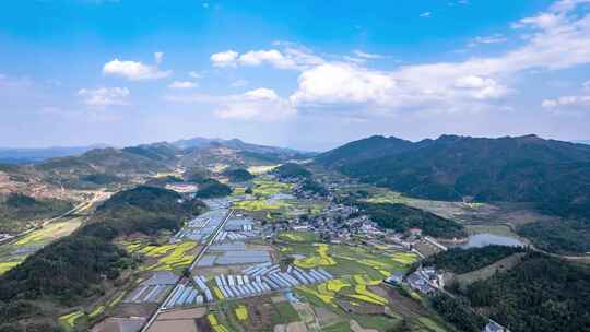 丘陵山川农田蓝天白云航拍延时8K