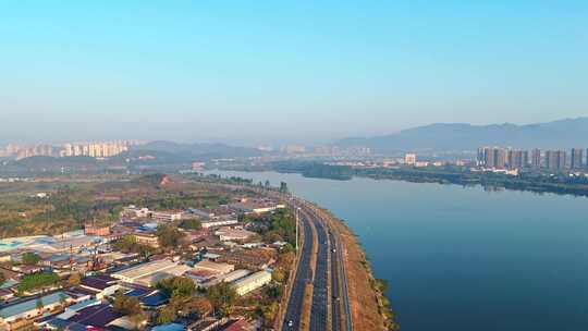 航拍冬季清晨惠州江南大道公路上运行的车流