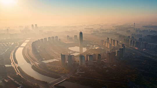 河南郑州市中心CBD大玉米楼航拍城市日出