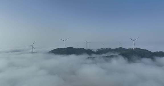 清晨山峰上的风力发电机组与云海仙境航拍