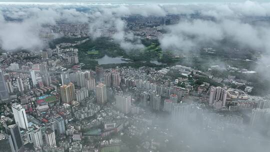 航拍云海中的广州越秀区城市建筑