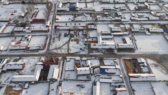 航拍内蒙古扎兰屯市冬季雪色村庄