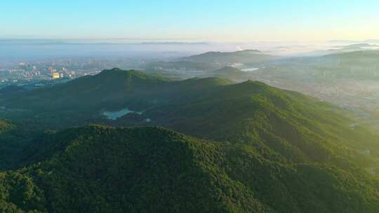 航拍广州白云山日出 眺望广州城区