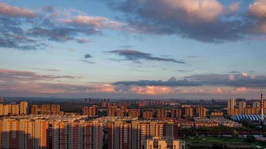 城市乌云傍晚落日雨后晚霞余晖视频素材模板下载