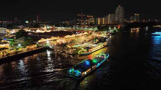 航拍泰国曼谷亚洲河滨夜市湄南河夜景风光