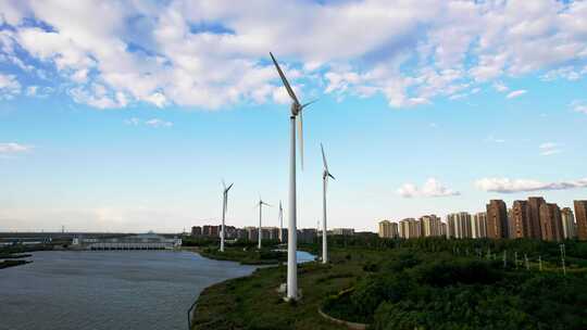 河堤河道旁风力发电机组城市风光自然风景