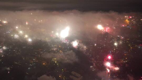 县城市烟花秀夜背景素材春节新年除夕夜航拍