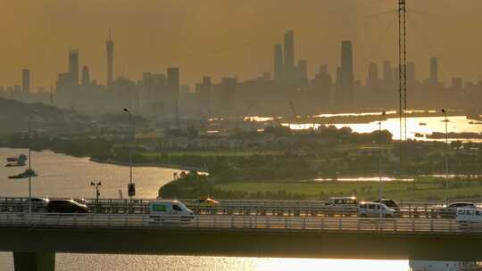 航拍黄埔大桥广州城区车流夕阳运沙船轮船