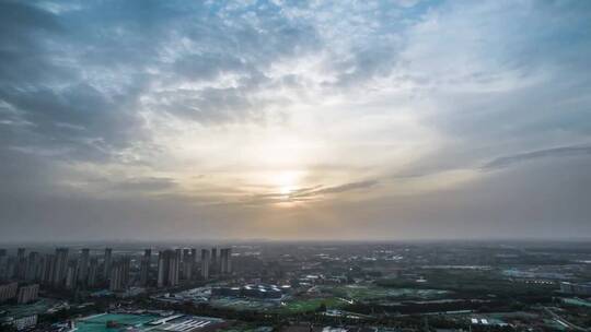 航拍延时城市全景日落夕阳云层