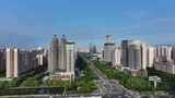 洛阳城市CBD楼房建筑道路交通航拍高清在线视频素材下载