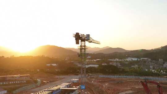 建筑工地航拍乡村建设农村开发吊塔日出工地