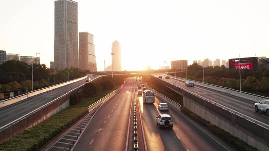 航拍夕阳下杭州市区道路视频素材模板下载