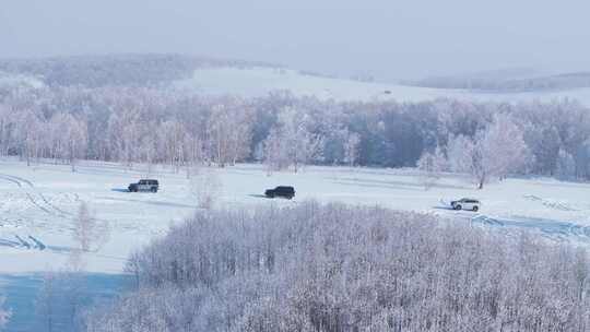 4K呼伦贝尔雪原雾凇车队行驶航拍5