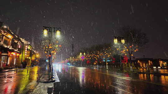 山西大同古城鼓楼夜景飘雪下雨雪景