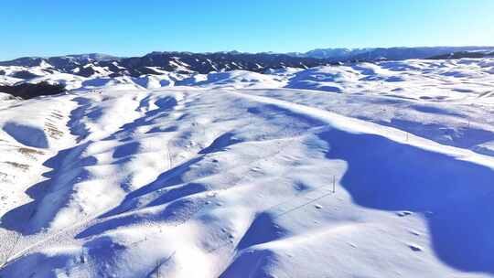 4k航拍冬季雪后祁连山草原