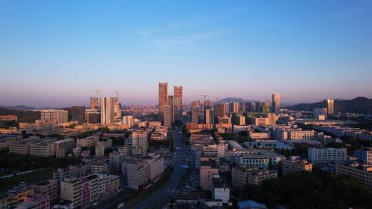 夕阳照耀深圳龙岗宝龙高楼建筑B