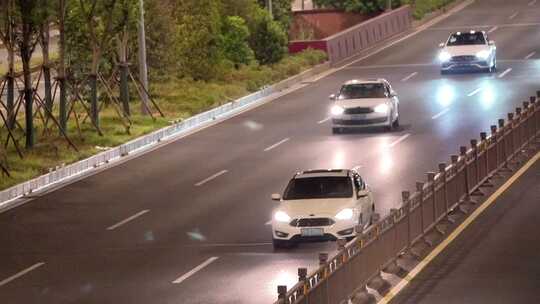 夜晚快速路隧道口车流马路行车亮化