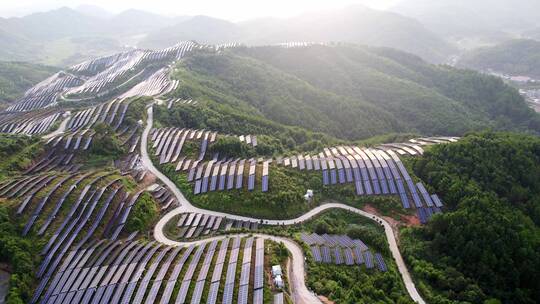 新能源太阳能光伏发电站山坡航拍视频素材模板下载