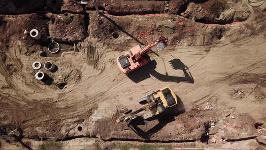 施工现场中的挖掘机推土机视频素材模板下载