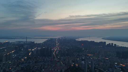 晚霞中的江西九江城市夜景航拍