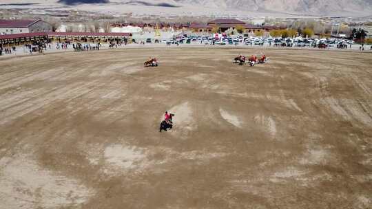 航拍新疆南疆塔县春节人文叼羊比赛