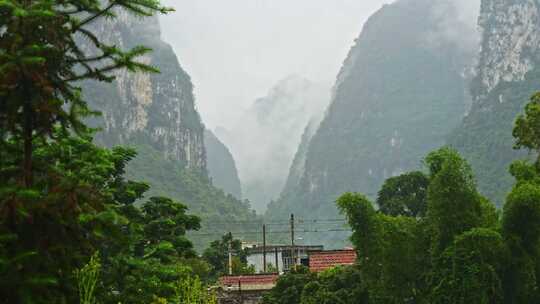 农村下雨雨景远山云雾雨季小雨