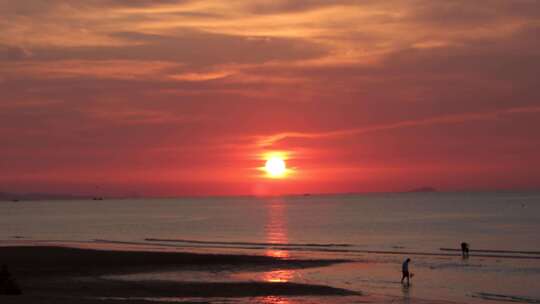 威海市环翠区金海路沙滩大海夕阳晚霞天空