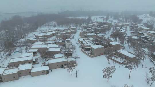 航拍雪天下的宁夏中卫黄河宿集