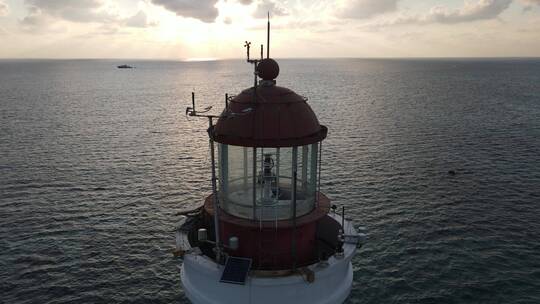 航拍西沙群岛中国海事灯塔夕阳DJI_0691视频素材模板下载