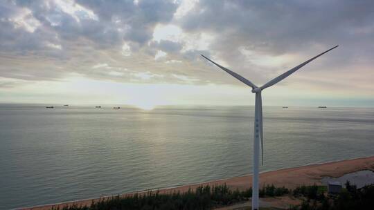 航拍中国海南海边的风车