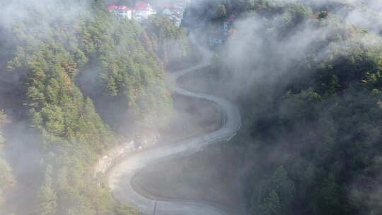 江西某地航拍盘山公路马路蜿蜒上山