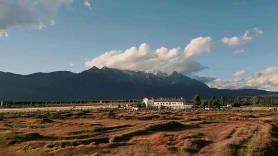 云南旅游丽江玉龙雪山下草场卡丁车跑道