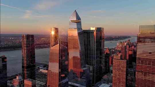 城市航拍纽约曼哈顿哈德逊广场摩天大楼日出视频素材模板下载