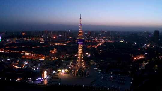 新疆喀什古城航拍4K昆仑塔特色建筑夜景视频素材模板下载