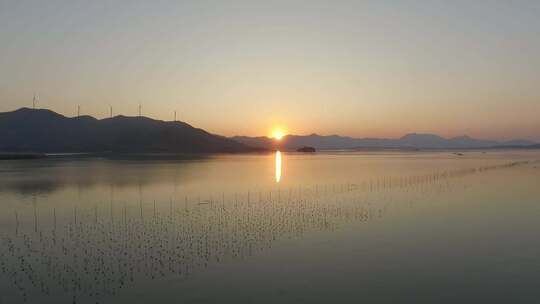 航拍后拉海面夕阳