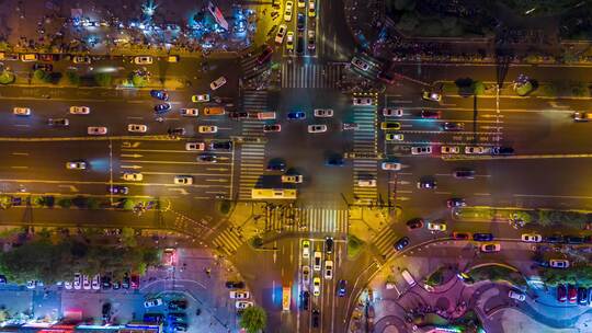 旋转俯拍城市交叉路口夜景交通延时四川内江