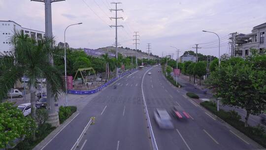 城市车流晚霞风景