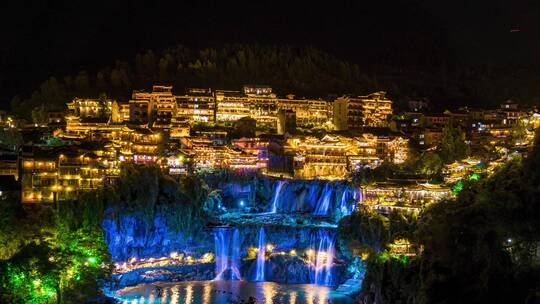 4K实拍湖南湘西芙蓉镇瀑布夜景延时摄影视频素材模板下载