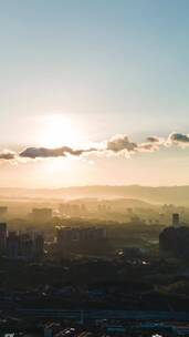 航拍夕阳日落城市剪影延时摄影