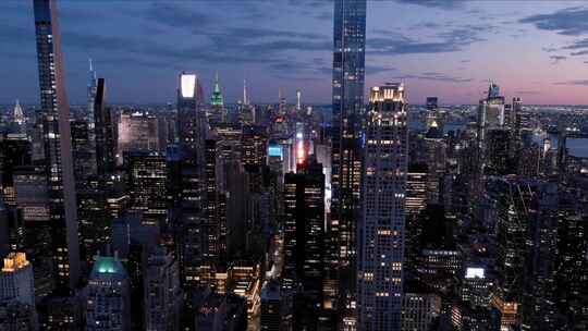 航拍纽约曼哈顿市中心摩天大楼日落夜景灯光