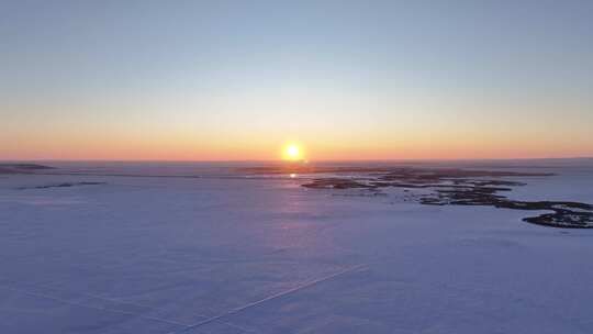 寒冬雪原夕阳西下