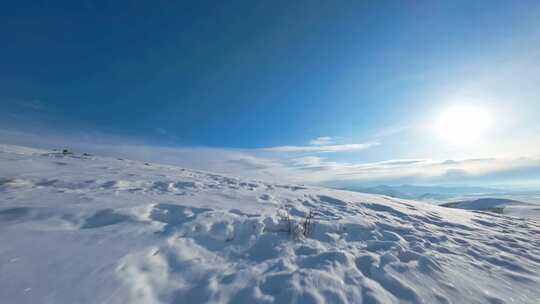 FPV无人机航拍雪景雪山森林日出蓝天白云视频素材模板下载