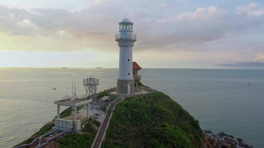 海南瞭望塔海南海边风光灯塔风车视频视频素材模板下载