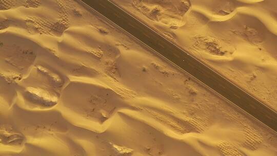 航拍高清沙漠中间笔直的公路